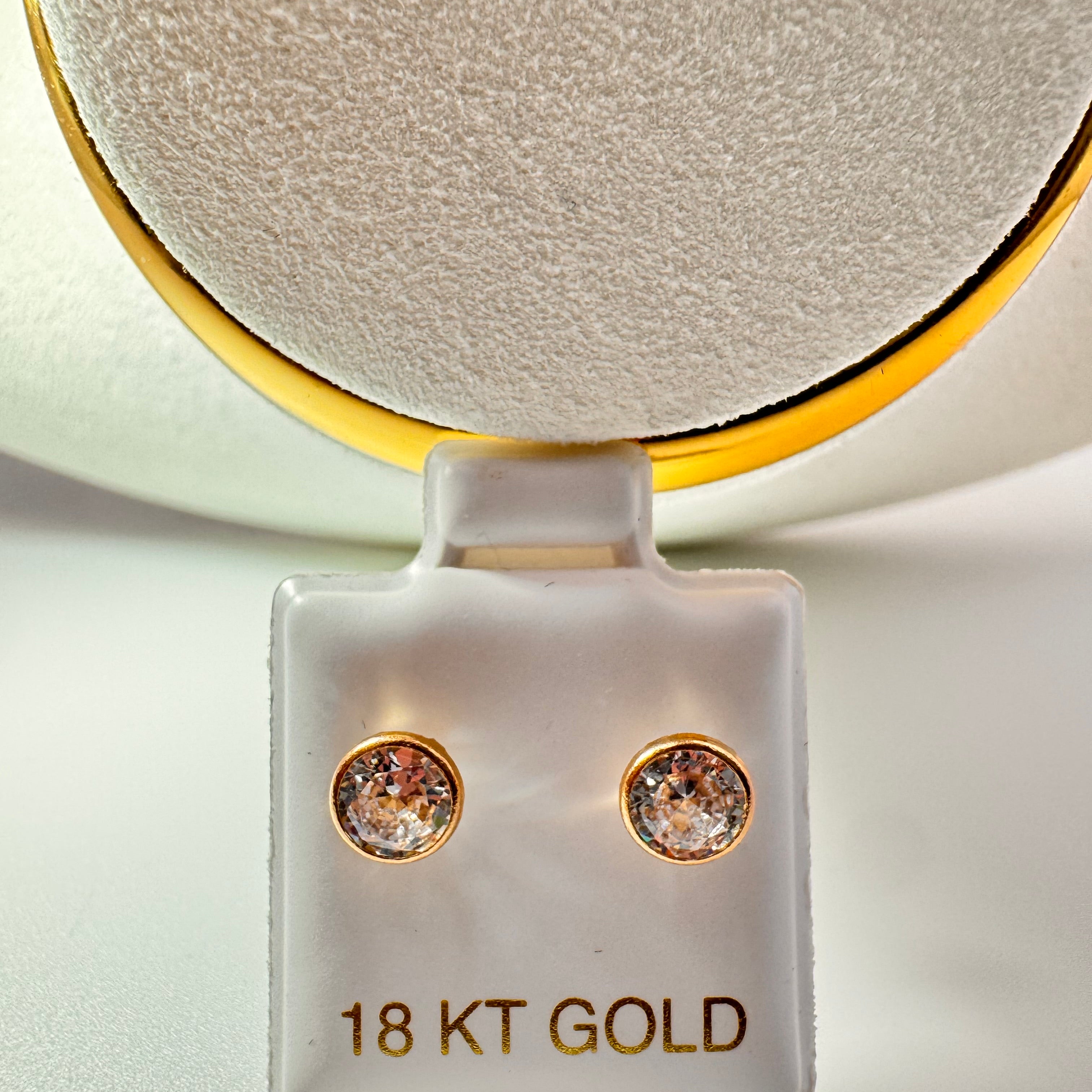 Gold-rimmed earrings 18k